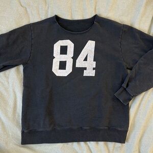 Brandy Melville Black Sweatshirt with White '84' Graphic